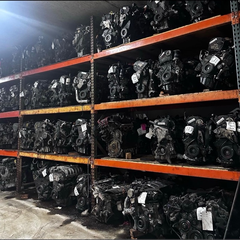 Warehouse racks stacked with tested used engines at Villanueva Auto in Salinas